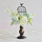 green birdcage
